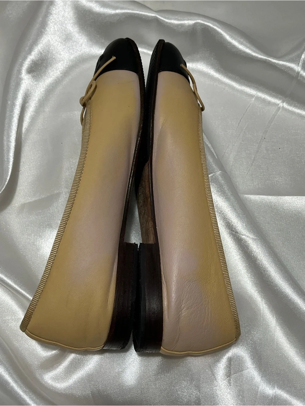 CHANEL Beige Leather Ballet Flats with Black Cap Toe and CC Logo